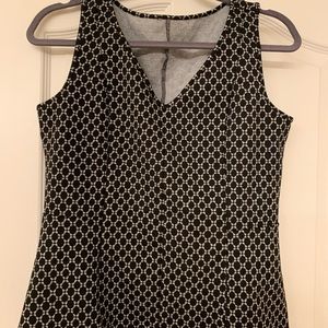 Peplum style sleeveless top